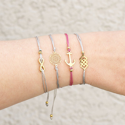 Bracelet with Infinity and heart pendant and Happiness greeting card
