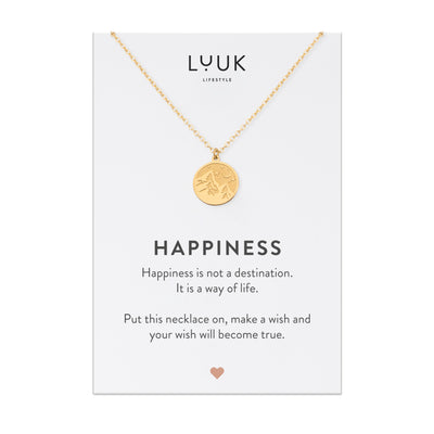 Goldene Halskette mit berg Anhänger auf Happiness Spruchkarte von der Brand Luuk Lifestyle