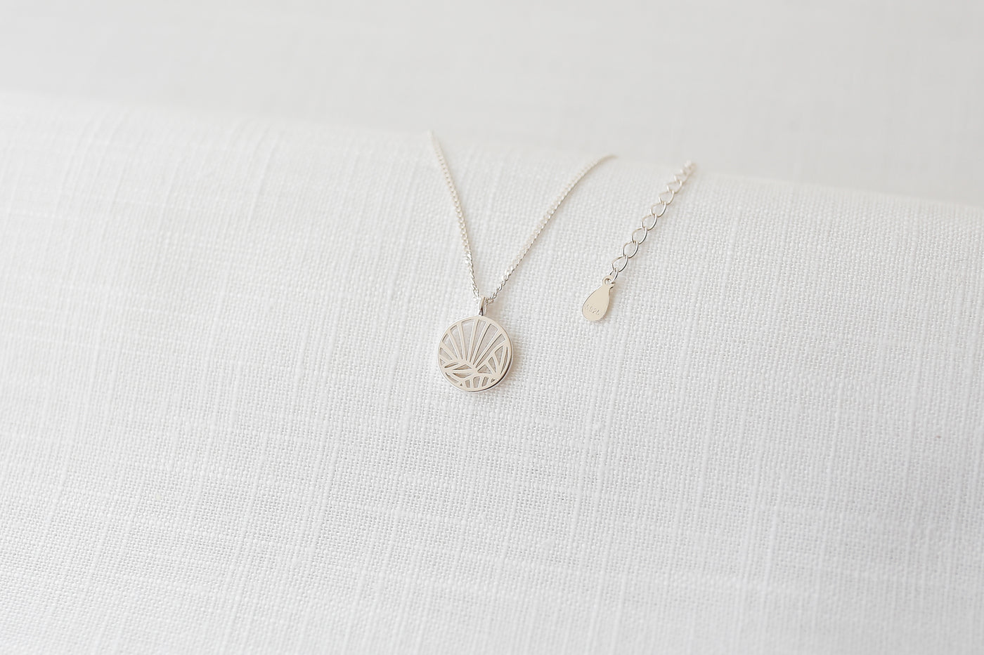 Sterling silver necklace with small pendant and Simplicity saying card