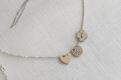 Necklace with lucky charm pendant and Happiness greeting card