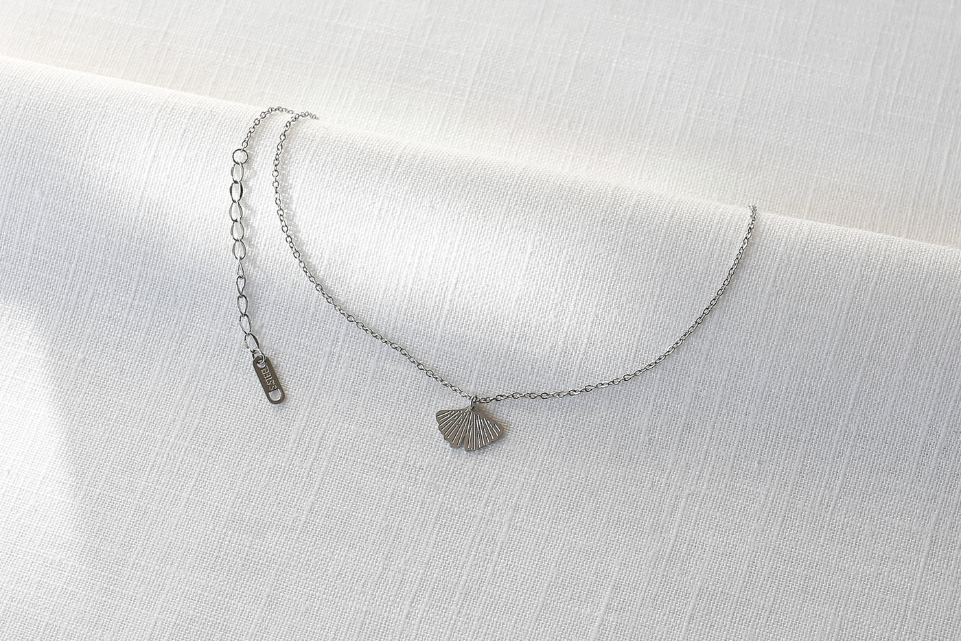 Necklace with ginkgo leaf pendant and Happiness greeting card