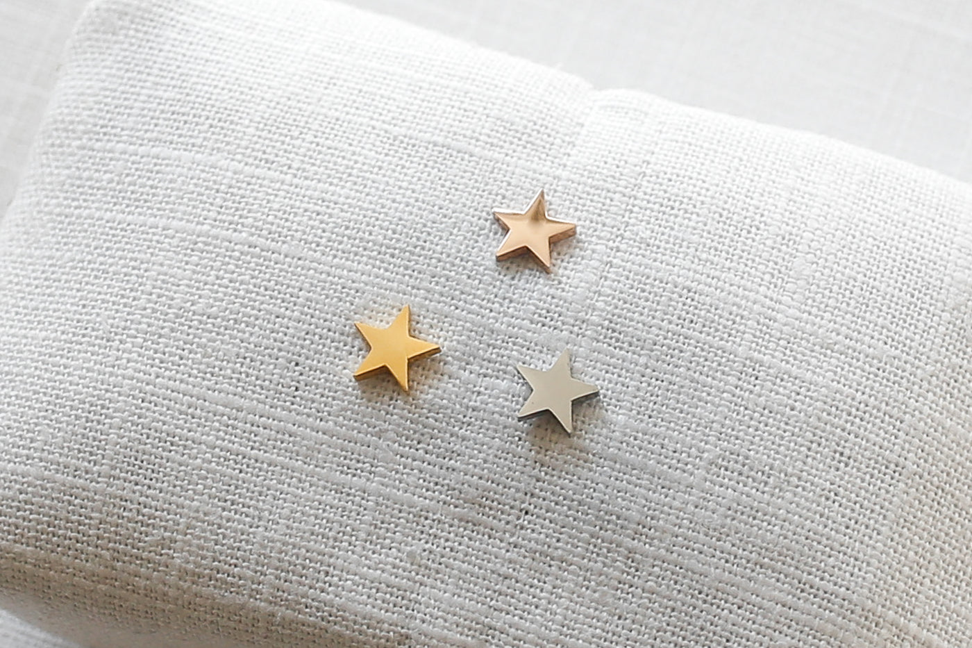 Drei Sternen Ohrringe in jeweils Rosegold, Gold und Silber