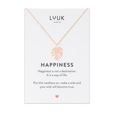 Halskette mit Monstera Blatt Anhänger in Rosegold auf Happiness Spruchkarte von Luuk Lifestyle