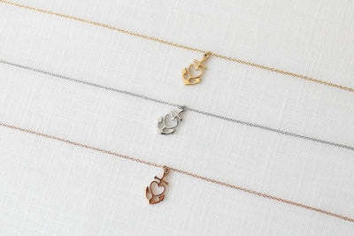 Drei klassische Halsketten mit Herz Anker Anhänger in jeweils drei verschiedenen Farb Ausführungen