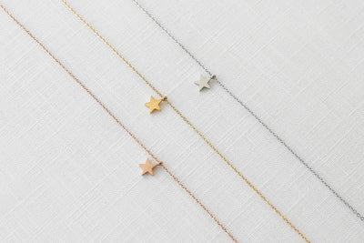 Drei hochwertige Halsketten aus Edelstahl mit Stern Anhänger in jeweils Silber, Gold und Rosegold