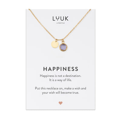 Goldene Halskette mit lilanem Kristall Anhänger auf Happiness Spruchkarte von der Brand Luuk Lifestyle
