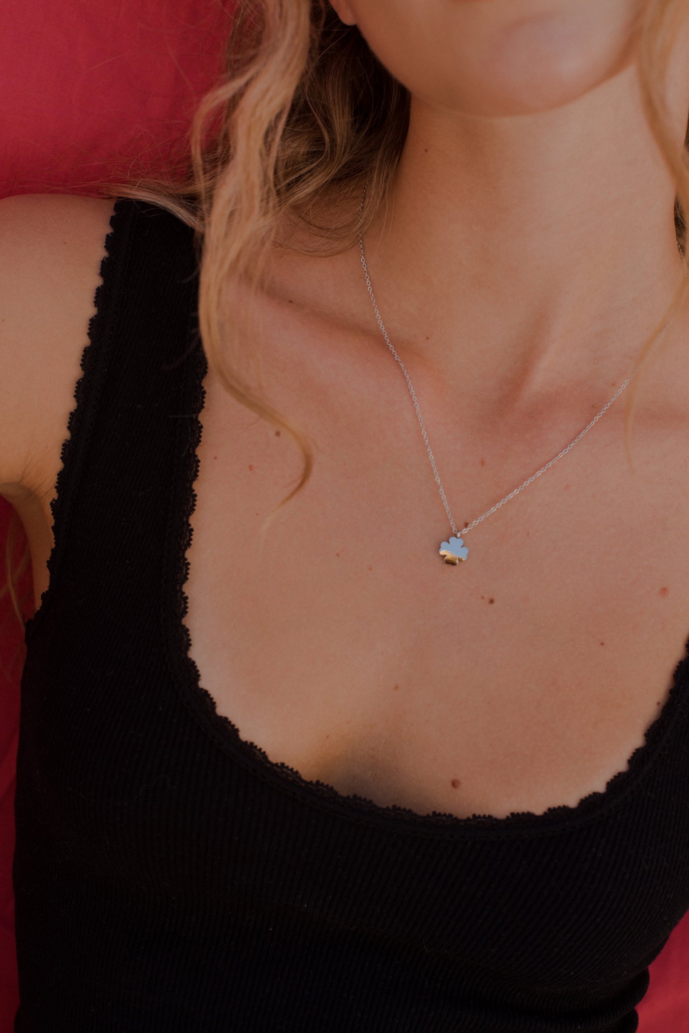 Necklace with clover leaf pendant and Happiness greeting card