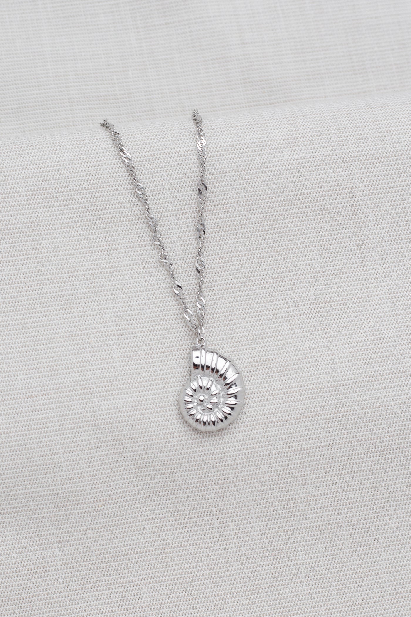 Necklace with lotus blossom pendant and Happiness greeting card